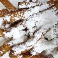 Funnel Cake Fries · Delicious state fair inspired treat using homemade funnel cake batter and fried to crispy pe...