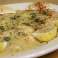 Chicken Piccata · Boneless chicken breast with butter, lemon, white wine and capers.