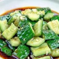 Cucumber And Garlic 脆口黄瓜 · Cucumber mixed with dressing.