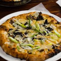 Forest Mushroom Pizza · Truffle Roasted Mushrooms, Scallions, Fontina al Agosta. Vegetarian.