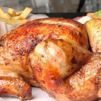 Tumi Chicken Combo Especial · Tumi's famous juicy family-style rotisserie chicken served with steak cut fries and salad. /...