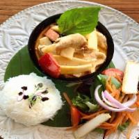 Lunch Red Curry · Red curry paste with bamboo shoot, eggplant, curry carrot bell pepper and basil in coconut m...