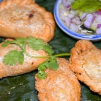 Curry Puff · Minced chicken, potato, mixed peas & carrot, onion in puff pastry with cucumber vinaigrette ...
