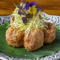 Crab Roll (Hoy Jor) · Deep-fried bean curd paper stuffed with ground shrimp, lump crab meat, water chestnuts serve...