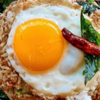 Khao Klook Kaprow Khai Dow (Basil Fried Rice) · Spicy. Traditional Thai basil fried rice with garlic, chili, onion, long hot pepper, and bas...