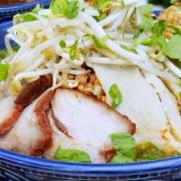 Sukothai Noodle Soup (Kuay Teaw Tom Yum) · Spicy. Thin rice noodle, roast pork, ground pork, fish balls, bean sprout, garlic, ground, p...