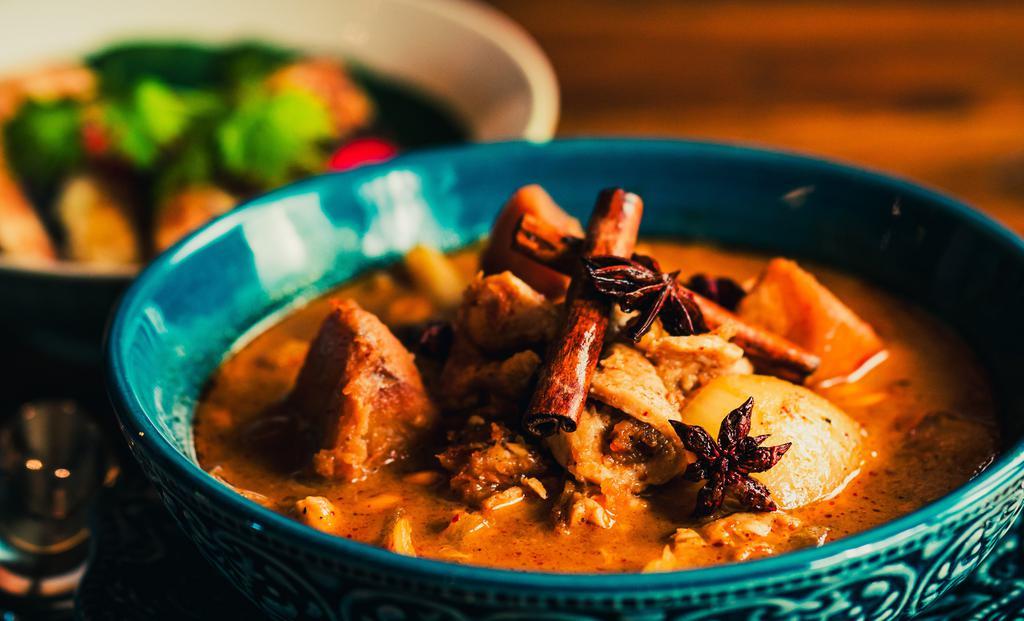 Massaman Curry With Roti · Mild. Sweet curry paste, potato, peanut, onion, fried shallot, coconut milk.