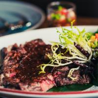 Nuer Yang · Gluten-free. Pan-seared steak seasoned with sea salt and black pepper. Served with steamed m...