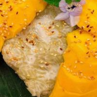 Mango Sticky Rice · Fresh whole mango with pandan infused sticky rice, topped with coconut milk drizzle