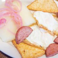 Yuca Con Huevo, Salami Y Queso Frito · Cassava with eggs, salami, and fried cheese.