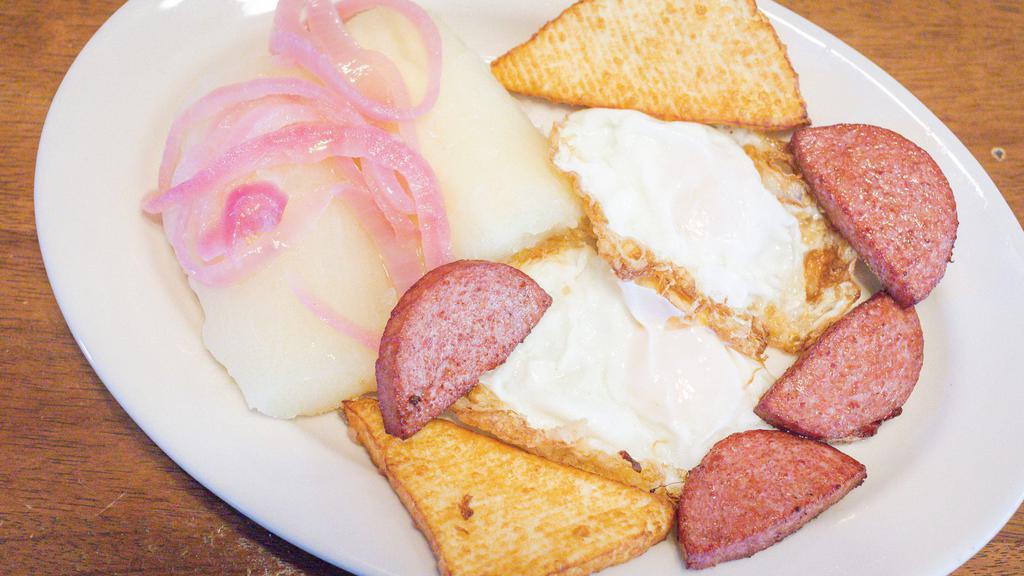 Yuca Con Huevo, Salami Y Queso Frito · Cassava with eggs, salami, and fried cheese.