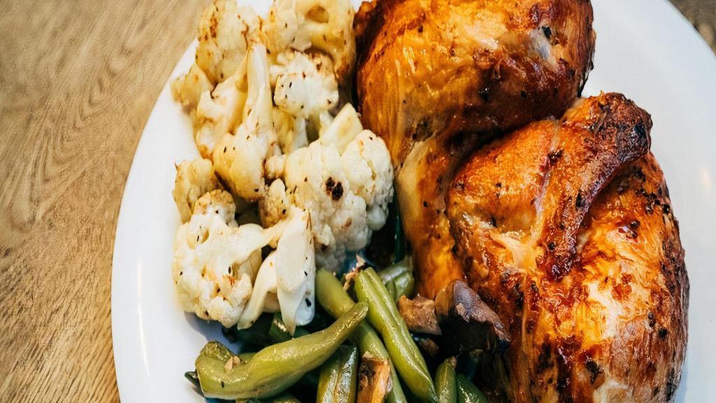 1/2 Chicken + 2 Sides + 2 Sauces · Our chickens are all natural, free roaming, antibiotic and hormone free. Roasted with farm fresh herbs and spices.