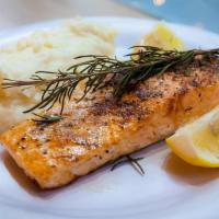 Roasted Salmon And 1 Side · Roasted Salmon with paprika, salt, pepper, rosemary on top with a piece of lemon