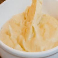 Mashed Potatoes · Real potatoes (idaho), butter, milk, salt and parmesan.