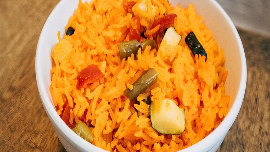Rice With Veggies · Basmati rice, eggplant, zucchini, yellow squash, red and yellow peppers.