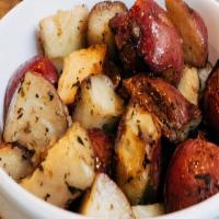 Roasted Potatoes · Red potatoes roasted in olive oil with thyme, salt, and pepper.