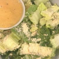 Ceasar Salad · Romaine lettuce, caesar dressing, parmesan cheese. NO CROUTONS!