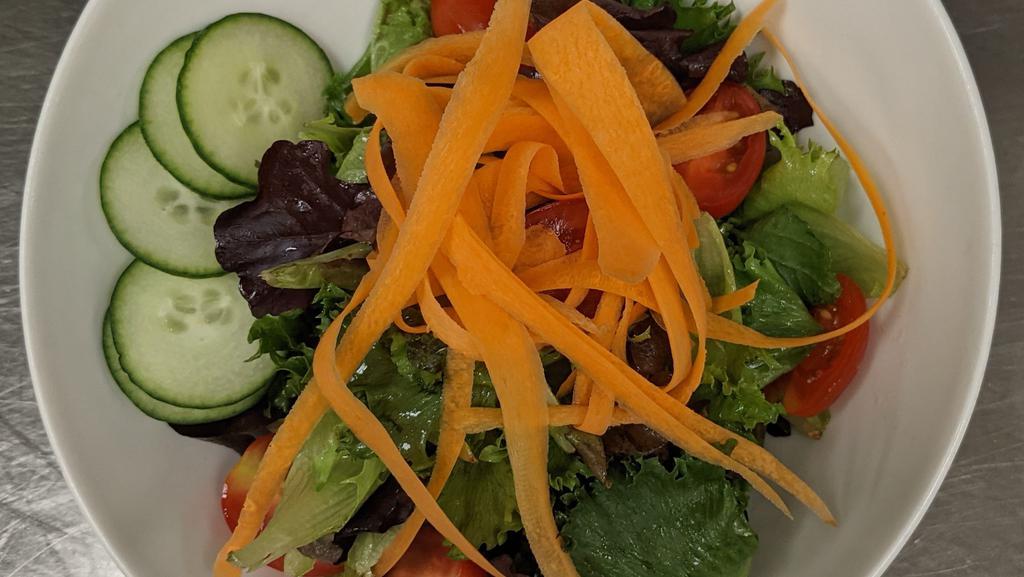 Green Salad · Dairy free, vegan, gluten free. Mixed greens, carrots, cucumbers, cherry tomatoes, radish, lemon vinaigrette.