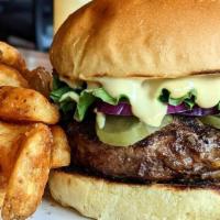 Grass Fed Burger · White Cheddar, brioche bun jersey tomato, lettuce, dill pickle, sidewinder fries.