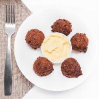 Falafel · Our very own homemade recipe served with hummus.