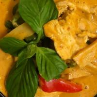 Thai Red Curry · Spicy. Coconut milk, bamboo shoot, string bean, bell pepper, and basil.