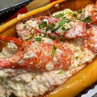 Rincón Lobster Roll · Succulent butter soaked lobster meat served warm.