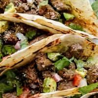 Street Tacos · Three corn tortillas, lettuce, pico de gallo, salsa, cheese and your choice of protein.