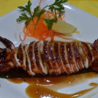 Ika Maruyaki · Grilled squid with ginger sauce.