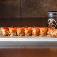 Dynamite Roll · Spicy salmon roll with spicy tuna outside or extra spicy sauce on the top.