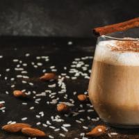Almond Latte Smoothie · Banana, nut milk, almonds, agave, and cinnamon.