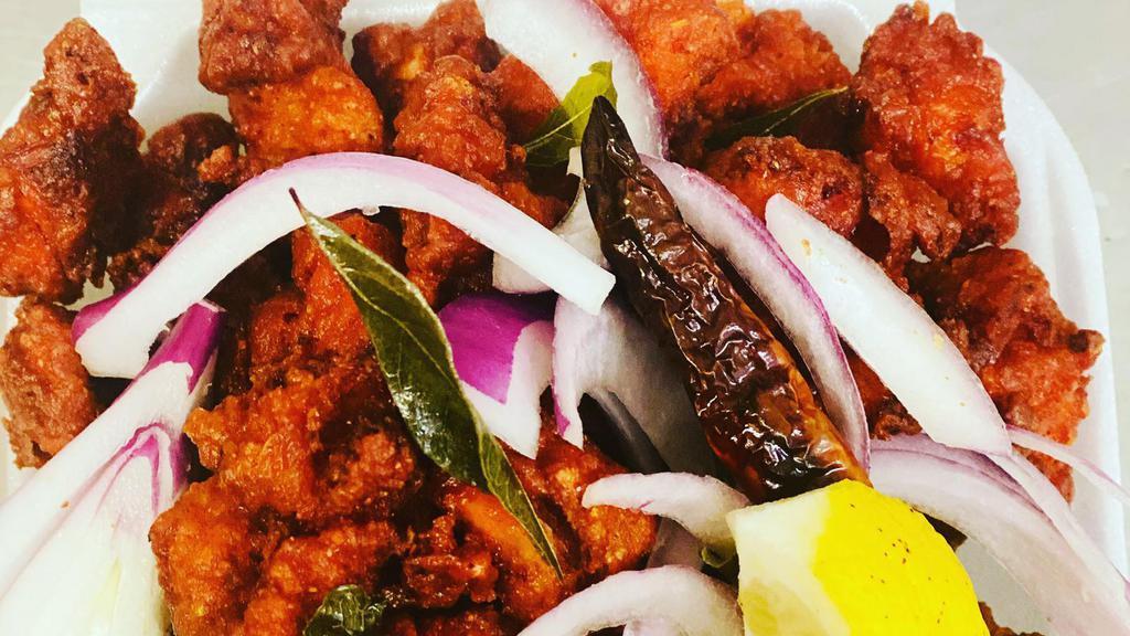 Chicken 65 · Boneless chicken cubes are well marinated in secret spices with yogurt and browned to perfection.