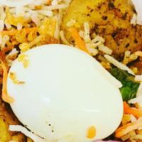 Shrimp Biryani · Saffron Rice layered over slow cooked shrimp with aromatic spices & Special masala.