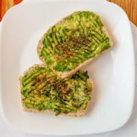Avocado Toast · Two slices of our oat bread with smashed avocado, sea salt & freshly ground pepper (vegan, s...