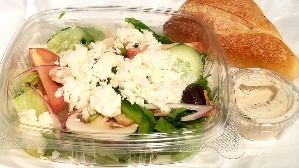 Greek Salad · Romaine lettuce with cucumbers, tomatoes, olives, onions, and feta cheese in the creamy Greek dressing.
