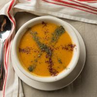 Lentil Soup · Pureed red lentil, onions, carrots, garlic, butter, tomato paste, cumin, black pepper, and d...