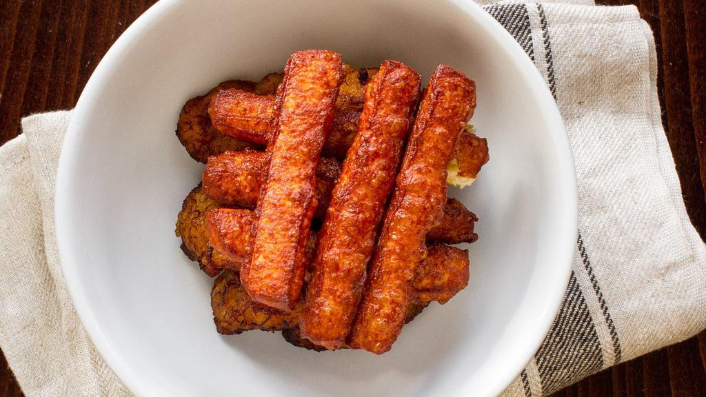 Maduros Con Queso · Sweet plantains with fried cheese.