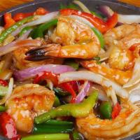 Mongolian Skillet · Marinated slices and sautéed with ginger scallions, onions & bell peppers with chef's brown ...