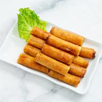 Lumpiang Shanghai · Ground pork and vegetables wrapped in egg roll, deep-fried, served with sweet and sour sauce.