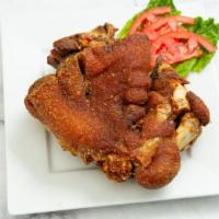 Crispy Pata · Deep fried pork knuckle served with house vinegar sauce.