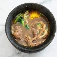 Bulalo · Beef shank soup with onions and vegetables.