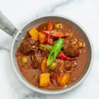 Kalderetang Baka · Spicy beef stew cooked in tomato sauce and spices.