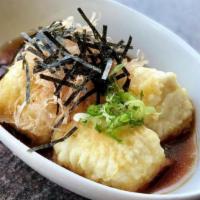 Agedashi Tofu · Lightly fried tofu served with bonito flakes, seaweed and scallions.