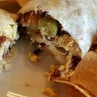 Amigo'S Burrito · Scrambled eggs, potatoes, cheese. With bacon, ham, or sausage for an additional charge.