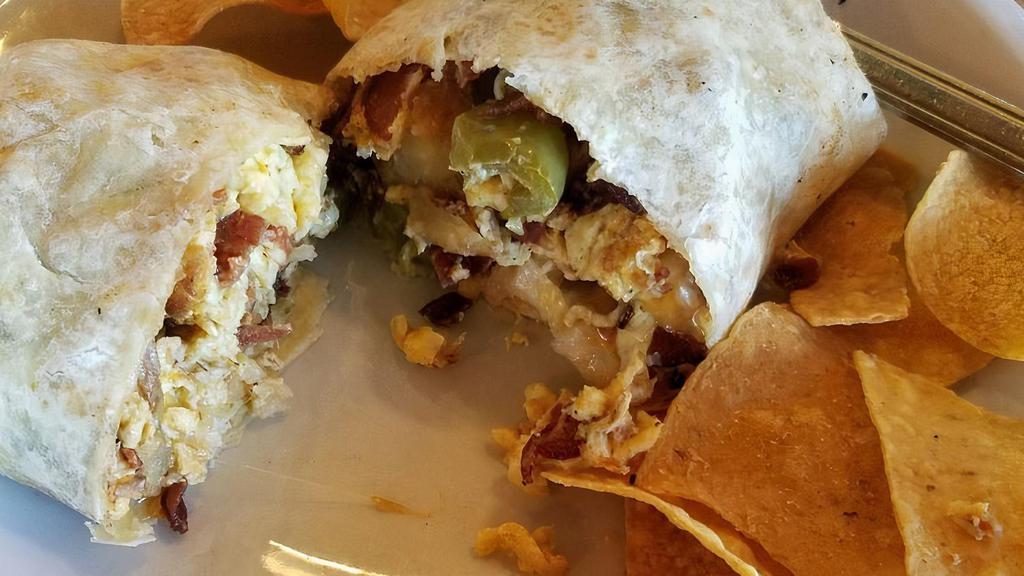 Amigo'S Burrito · Scrambled eggs, potatoes, cheese. With bacon, ham, or sausage for an additional charge.