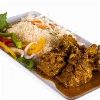 Curried Chicken · This is curry with a little kick. Bite-sized pieces of chicken (with bones cause that's the ...