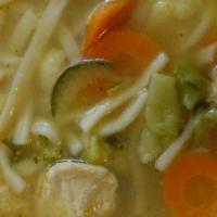 Chicken Soup · Chunks of chicken with fresh onion.