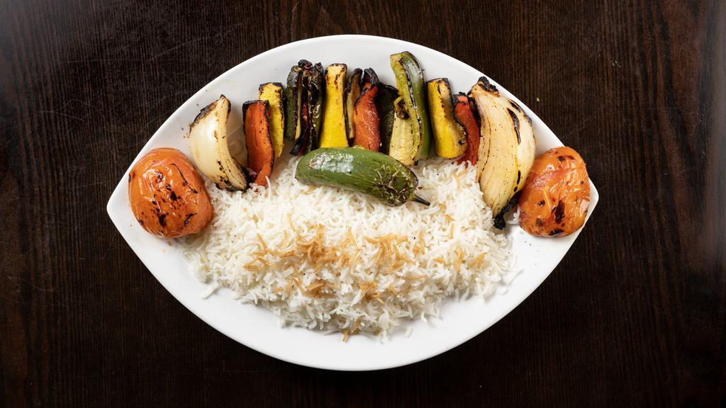 Vegetable Kebab · Onions, tomatoes, green/red bell peppers, jalapeños, zucchini with special spices.
