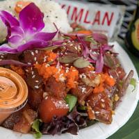 Aloha Tuna Pokerrito · Ahi tuna, spicy tuna, cucumber and seaweed salad, edamame, red onion, ginger, crispy garlic,...