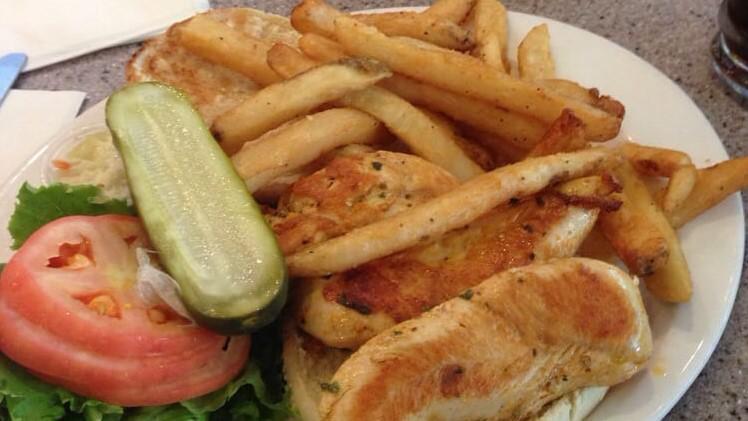 Grill Chicken Tender Sandwich Deluxe · With lettuce, tomato, and French fries.
