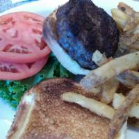 Angus Slider Deluxe · With lettuce, tomato, and French fries.